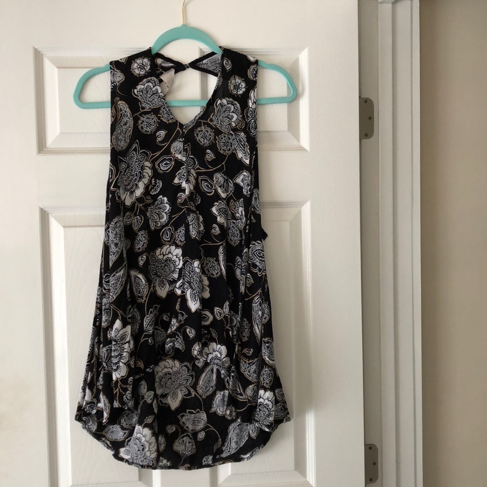 Free people sleeveless high low top